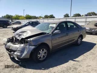 2006 Toyota Camry LE with VIN 4T1BF30K46U631809, listed as a Copart auction lot 67420125 with 121,995 mi miles and Salvage title. Bid and sale history available at DreamBid. Image 1.