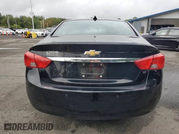 2014 Chevrolet Impala LT with VIN 1G1125S34EU170843, listed as a Copart auction lot 82053455 with 98,773 mi miles and Salvage title. Bid and sale history available at DreamBid. Image 6.