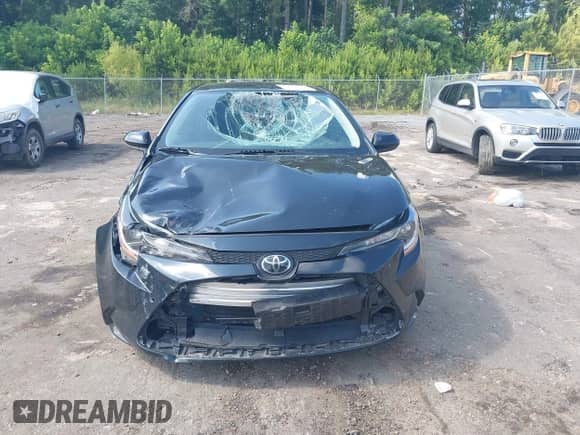 2021 Toyota Corolla L with VIN JTDDPMAE8MJ148623, listed as a IAAI auction lot 42423111 with 131,460 mi miles and . Bid and sale history available at DreamBid. Image 13.