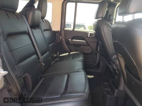 2021 Jeep Wrangler Unlimited Sahara with VIN 1C4HJXEN6MW590284, listed as a Copart auction lot 61804035 with 74,789 mi miles and Salvage title. Bid and sale history available at DreamBid. Image 11.