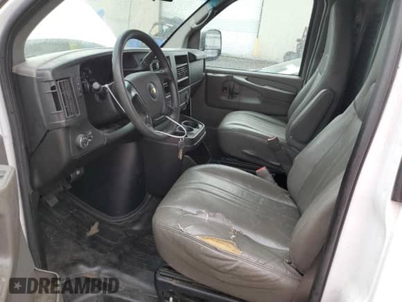 2014 Chevrolet Express Cargo with VIN 1GCWGGBA1E1193958, listed as a Copart auction lot 77208494 with 126,193 mi miles and Clean title. Bid and sale history available at DreamBid. Image 7.