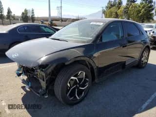 2022 Hyundai Ioniq 5 SE с VIN KM8KM4AE9NU119241, выставлен на аукционе Copart как лот 63799725 с пробегом 62 642 миль миль и Списание • Salvage title. История ставок и продаж доступна на DreamBid. Изображение 1.