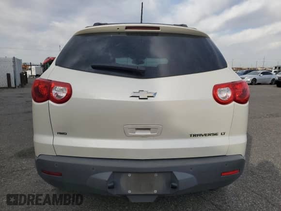 2012 Chevrolet Traverse 1LT z VIN 1GNKVGED0CJ276215, wystawiony jako Copart lot #86154995 z przebiegiem 159 498 mil mil oraz Szkoda całkowita • Salvage title. Historia ofert i sprzedaży dostępna na DreamBid. Obrazek 6.