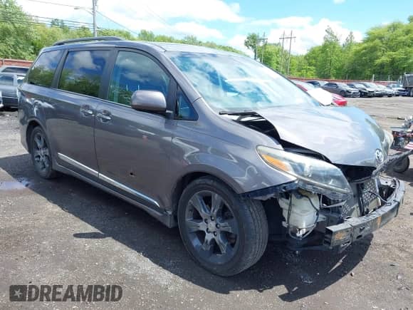 2015 Toyota Sienna SE with VIN 5TDXK3DC2FS559232, listed as a IAAI auction lot 42341965 with 130,732 mi miles and . Bid and sale history available at DreamBid. Image 18.