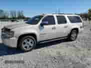 2010 Chevrolet Suburban LTZ with VIN 1GNUKKE38AR177636, listed as a Copart auction lot 86234575 with 217,383 mi miles and Clean title. Bid and sale history available at DreamBid. Image 1.