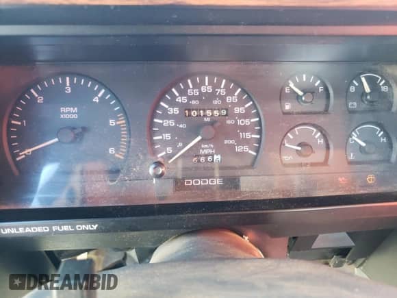 1992 Dodge Dakota z VIN 1B7FL23X0NS581033, wystawiony jako Copart lot #72280124 z przebiegiem 101 559 mil mil oraz Czysty tytuł • Clean title. Historia ofert i sprzedaży dostępna na DreamBid. Obrazek 9.