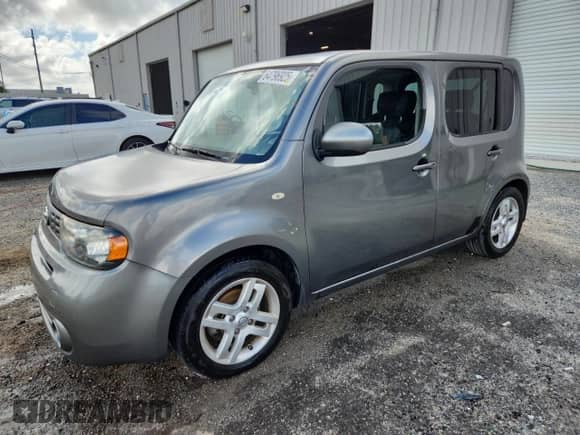 2012 Nissan Cube SL с VIN JN8AZ2KR1CT255393, выставлен на аукционе Copart как лот 64796925 с пробегом 115 582 миль миль и Списание • Salvage title. История ставок и продаж доступна на DreamBid. Изображение 1.