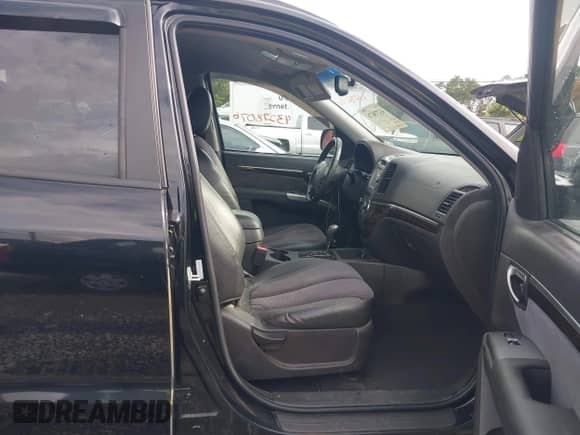 2012 Hyundai Santa Fe SE z VIN 5XYZH4AG5CG096869, wystawiony jako IAAI lot #43278076 z przebiegiem 185 721 mil mil oraz . Historia ofert i sprzedaży dostępna na DreamBid. Obrazek 5.