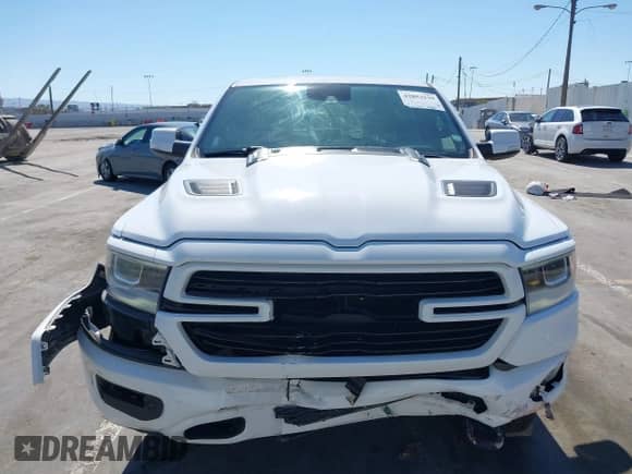 2020 Ram 1500 Laramie z VIN 1C6SRFJT3LN308871, wystawiony jako IAAI lot #42853239 z przebiegiem 45 620 mil mil oraz . Historia ofert i sprzedaży dostępna na DreamBid. Obrazek 12.