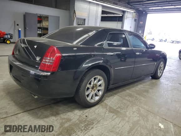 2005 Chrysler 300 C with VIN 2C3JA63H35H134241, listed as a Copart auction lot 86671005 with 154,321 mi miles and Clean title. Bid and sale history available at DreamBid. Image 3.