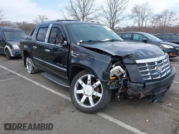 2010 Cadillac Escalade EXT Luxury with VIN 3GYVKMEF6AG285931, listed as a IAAI auction lot 41847789 with 157,838 mi miles and . Bid and sale history available at DreamBid. Image 1.