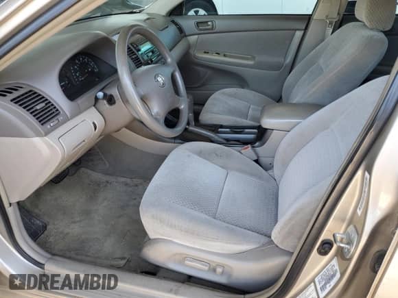 2003 Toyota Camry XLE with VIN 4T1BE32K23U765679, listed as a Copart auction lot 61942494 with Not provided miles and Salvage title. Bid and sale history available at DreamBid. Image 7.