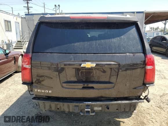 2018 Chevrolet Tahoe LS с VIN 1GNSKAKC7JR200913, выставлен на аукционе Copart как лот 62184165 с пробегом 92 869 миль миль и Списание • Salvage title. История ставок и продаж доступна на DreamBid. Изображение 6.