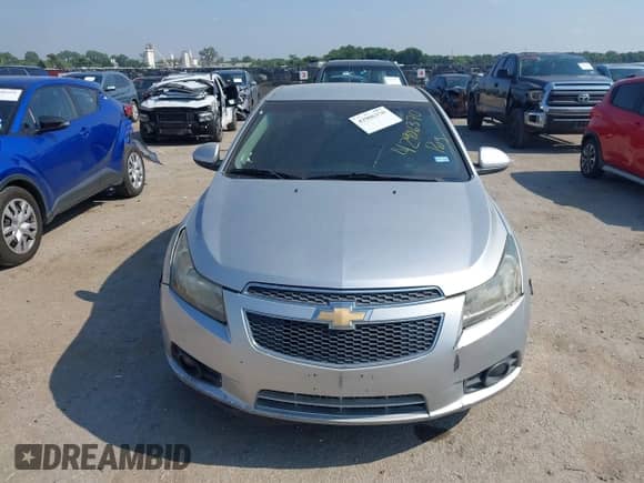 2012 Chevrolet Cruze ECO z VIN 1G1PJ5SC0C7266333, wystawiony jako IAAI lot #42906370 z przebiegiem 158 115 mil mil oraz . Historia ofert i sprzedaży dostępna na DreamBid. Obrazek 12.