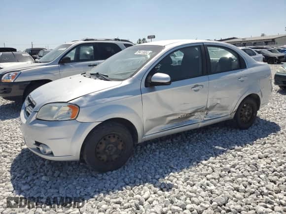 2011 Chevrolet Aveo 2LT с VIN KL1TG5DE0BB185998, выставлен на аукционе Copart как лот 69419664 с пробегом 163 949 миль миль и Списание • Salvage title. История ставок и продаж доступна на DreamBid. Изображение 1.
