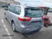 2018 Toyota Sienna L with VIN 5TDZZ3DC4JS945535, listed as a IAAI auction lot 42219652 with 129,059 mi miles and . Bid and sale history available at DreamBid. Image 16.