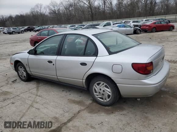 2002 Saturn SL с VIN 1G8ZF52842Z210146, выставлен на аукционе Copart как лот 82532764 с пробегом 191 952 миль миль и Списание • Salvage title. История ставок и продаж доступна на DreamBid. Изображение 2.