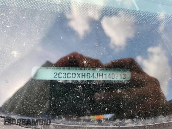 2018 Dodge Charger SXT Plus z VIN 2C3CDXHG4JH140713, wystawiony jako Copart lot #85725625 z przebiegiem Nie podano mil oraz Szkoda całkowita • Salvage title. Historia ofert i sprzedaży dostępna na DreamBid. Obrazek 12.