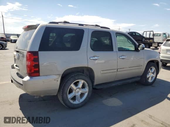 2007 Chevrolet Tahoe LTZ с VIN 1GNFK13047J352905, выставлен на аукционе Copart как лот 69778235 с пробегом 189 320 миль миль и Списание • Salvage title. История ставок и продаж доступна на DreamBid. Изображение 3.