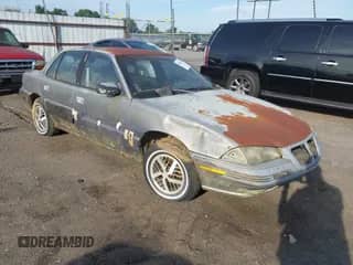 1992 Pontiac Grand Am с VIN 1G2NE54N3NM007717, выставлен на аукционе IAAI как лот 42639244 с пробегом 209 889 миль миль и . История ставок и продаж доступна на DreamBid. Изображение 1.