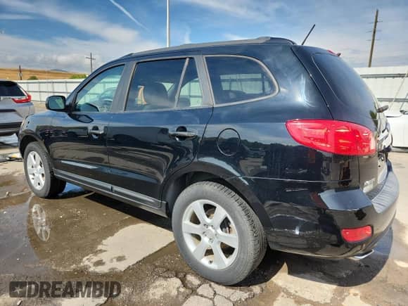 2007 Hyundai Santa Fe SE with VIN 5NMSH73E97H102098, listed as a Copart auction lot 70004575 with 148,596 mi miles and Clean title. Bid and sale history available at DreamBid. Image 2.