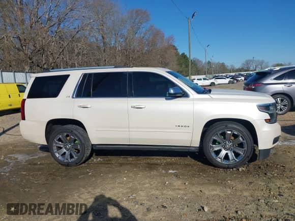 2015 Chevrolet Tahoe LTZ with VIN 1GNSCCKC3FR308607, listed as a IAAI auction lot 41799983 with 191,919 mi miles and . Bid and sale history available at DreamBid. Image 13.