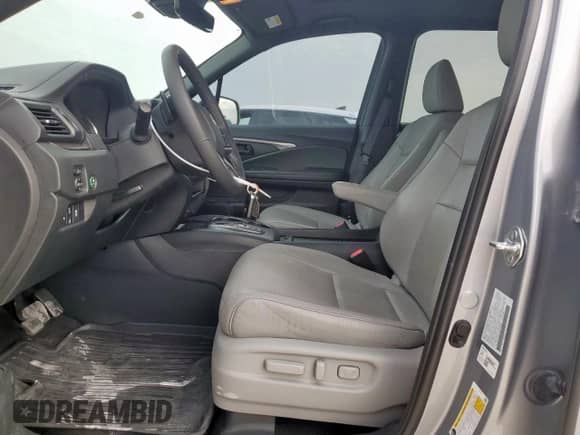 2023 Honda Passport EX-L with VIN 5FNYF8H51PB019622, listed as a Copart auction lot 63016095 with 39,737 mi miles and Clean title. Bid and sale history available at DreamBid. Image 7.