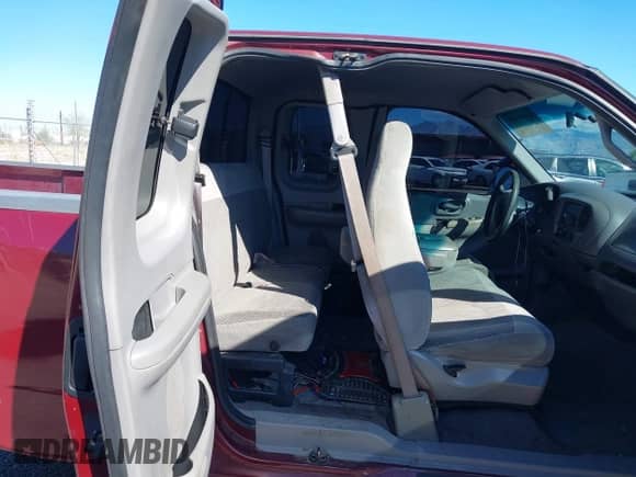 1999 Ford F-150 with VIN 1FTRX17W3XKB03527, listed as a IAAI auction lot 43450405 with 121,752 mi miles and . Bid and sale history available at DreamBid. Image 8.