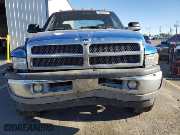 2001 Dodge 2500 with VIN 3B7KF23781G709364, listed as a Copart auction lot 87296495 with 31,000 mi miles and Salvage title. Bid and sale history available at DreamBid. Image 5.