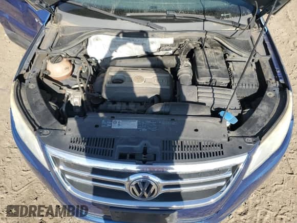 2010 Volkswagen Tiguan SE с VIN WVGBV7AX0AW003716, выставлен на аукционе Copart как лот 70834845 с пробегом 156 137 миль миль и Списание • Salvage title. История ставок и продаж доступна на DreamBid. Изображение 12.