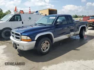 2004 Dodge Dakota SLT with VIN 1D7GL42K44S619650, listed as a Copart auction lot 63814295 with 268,984 mi miles and Salvage title. Bid and sale history available at DreamBid. Image 1.