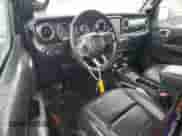 2022 Jeep Wrangler Unlimited Sahara z VIN 1C4HJXEGXNW211886, wystawiony jako Copart lot #54877645 z przebiegiem 64 815 mil mil oraz Szkoda całkowita • Salvage title. Historia ofert i sprzedaży dostępna na DreamBid. Obrazek 8.