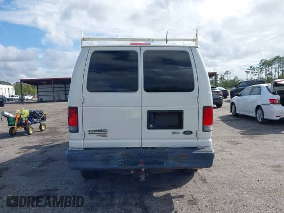 2013 Ford Econoline Cargo Commercial with VIN 1FTNE2EW0DDA41310, listed as a IAAI auction lot 43405112 with 185,163 mi miles and . Bid and sale history available at DreamBid. Image 16.
