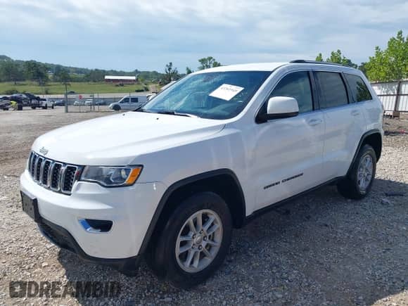 2020 Jeep Grand Cherokee Laredo E with VIN 1C4RJFAG4LC262853, listed as a IAAI auction lot 43261945 with 143,105 mi miles and . Bid and sale history available at DreamBid. Image 17.