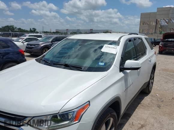 2018 Chevrolet Traverse LT with VIN 1GNERHKW5JJ137319, listed as a IAAI auction lot 42561862 with 97,664 mi miles and . Bid and sale history available at DreamBid. Image 6.