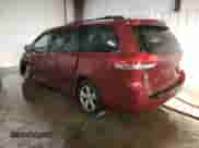 2014 Toyota Sienna LE with VIN 5TDKK3DC6ES518093, listed as a Copart auction lot 85151965 with 104,918 mi miles and Salvage title. Bid and sale history available at DreamBid. Image 2.