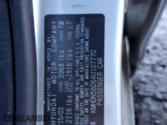 2004 Hyundai Elantra GT z VIN KMHDN56D64U107770, wystawiony jako Copart lot #84436064 z przebiegiem 285 779 mil mil oraz Szkoda całkowita • Salvage title. Historia ofert i sprzedaży dostępna na DreamBid. Obrazek 12.