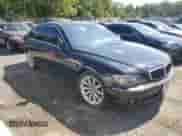 2008 BMW 7 Series 750i with VIN WBAHL83508DT12739, listed as a Copart auction lot 71648985 with 174,441 mi miles and Salvage title. Bid and sale history available at DreamBid. Image 4.