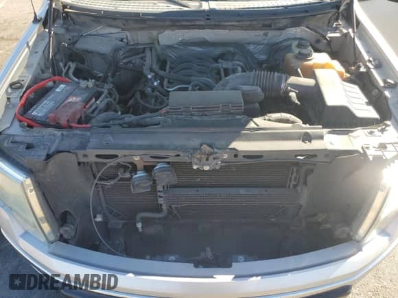 2011 Ford F-150 XL с VIN 1FTFX1CF7BFD40077, выставлен на аукционе Copart как лот 82623605 с пробегом 211 574 миль миль и Списание • Salvage title. История ставок и продаж доступна на DreamBid. Изображение 11.