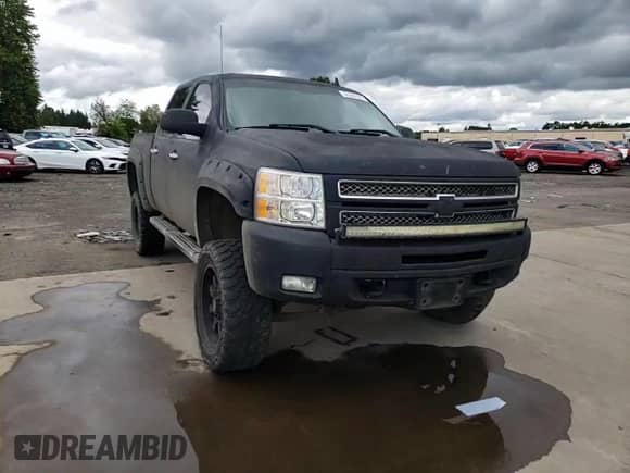 2012 Chevrolet Silverado 1500 LTZ with VIN 3GCPKTE72CG296137, listed as a Copart auction lot 56320765 with 180,551 mi miles and Salvage title. Bid and sale history available at DreamBid. Image 13.