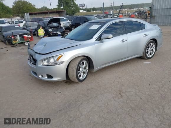 2014 Nissan Maxima SV with VIN 1N4AA5AP2EC472108, listed as a IAAI auction lot 43356452 with 144,998 mi miles and . Bid and sale history available at DreamBid. Image 2.