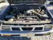 1995 Nissan Frontier XE z VIN 1N6HD16S6SC450675, wystawiony jako Copart lot #88047365 z przebiegiem 193 820 mil mil oraz Czysty tytuł • Clean title. Historia ofert i sprzedaży dostępna na DreamBid. Obrazek 11.