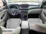 2021 Hyundai Tucson Value with VIN KM8J33A47MU389759, listed as a Copart auction lot 68165295 with 77,447 mi miles and Salvage title. Bid and sale history available at DreamBid. Image 8.