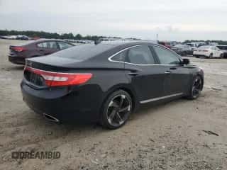 2013 Hyundai Azera с VIN KMHFH4JGXDA329886, выставлен на аукционе Copart как лот 75485654 с пробегом 141 865 миль миль и Списание • Salvage title. История ставок и продаж доступна на DreamBid. Изображение 3.