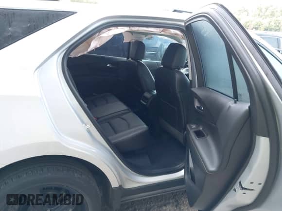 2021 Chevrolet Equinox Premier with VIN 2GNAXXEV8M6164551, listed as a IAAI auction lot 43130369 with 35,768 mi miles and . Bid and sale history available at DreamBid. Image 8.