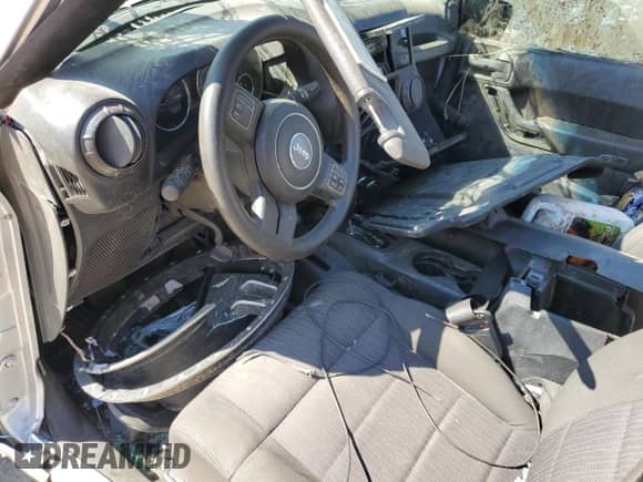 2012 Jeep Wrangler Sport с VIN 1C4AJWAG3CL232403, выставлен на аукционе Copart как лот 48869505 с пробегом Не указан миль и Списание • Salvage title. История ставок и продаж доступна на DreamBid. Изображение 8.