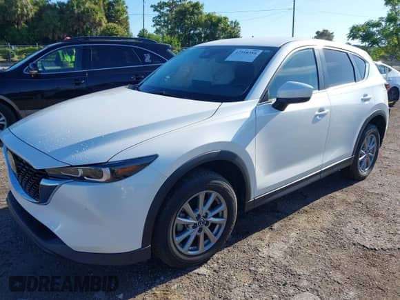 2022 Mazda CX-5 S Select z VIN JM3KFBBM6N0554189, wystawiony jako IAAI lot #42518384 z przebiegiem 46 491 mil mil oraz . Historia ofert i sprzedaży dostępna na DreamBid. Obrazek 2.
