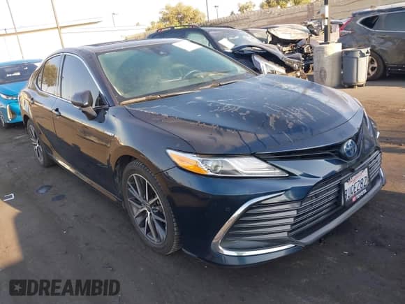 2021 Toyota Camry Hybrid XLE with VIN 4T1F31AK9MU547267, listed as a IAAI auction lot 42732726 with 106,937 mi miles and . Bid and sale history available at DreamBid. Image 1.