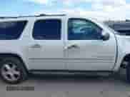 2014 Chevrolet Suburban LTZ with VIN 1GNSCKE08ER150520, listed as a IAAI auction lot 42236005 with 215,013 mi miles and . Bid and sale history available at DreamBid. Image 13.