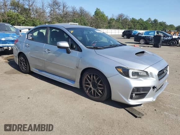 2015 Subaru WRX Premium with VIN JF1VA1D69F8815532, listed as a Copart auction lot 62452325 with 184,857 mi miles and Salvage title. Bid and sale history available at DreamBid. Image 4.
